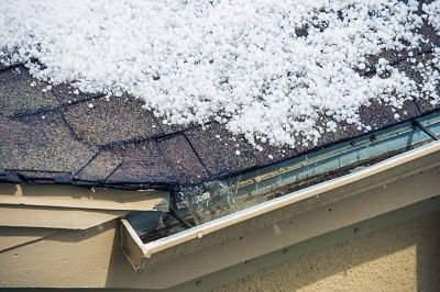 snow on slippery roof