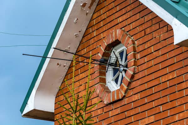 TV antenna mounted in window of home